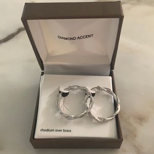 Diamond accent costume earrings.